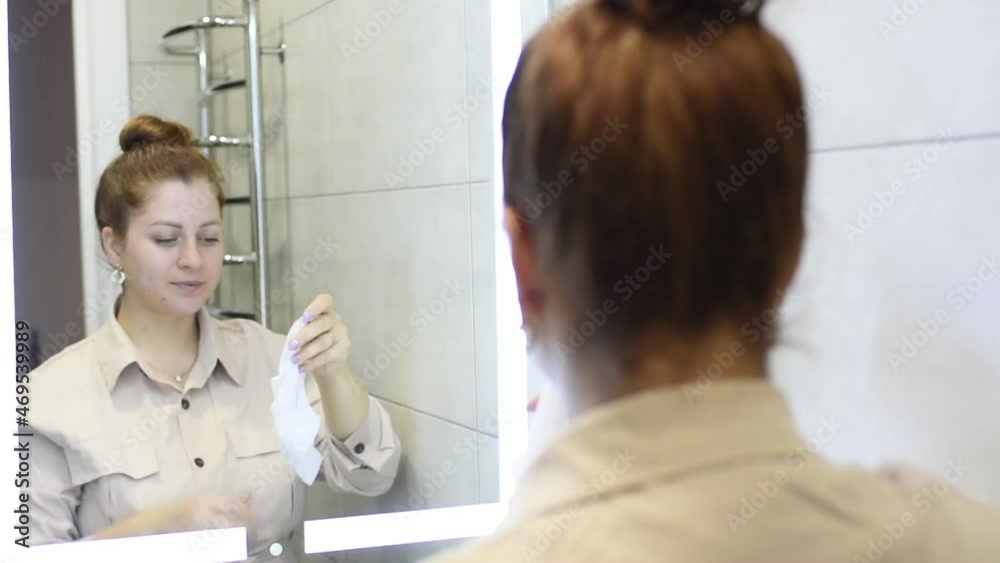 woman applying beauty mask on skin woman applying beauty mask on skin