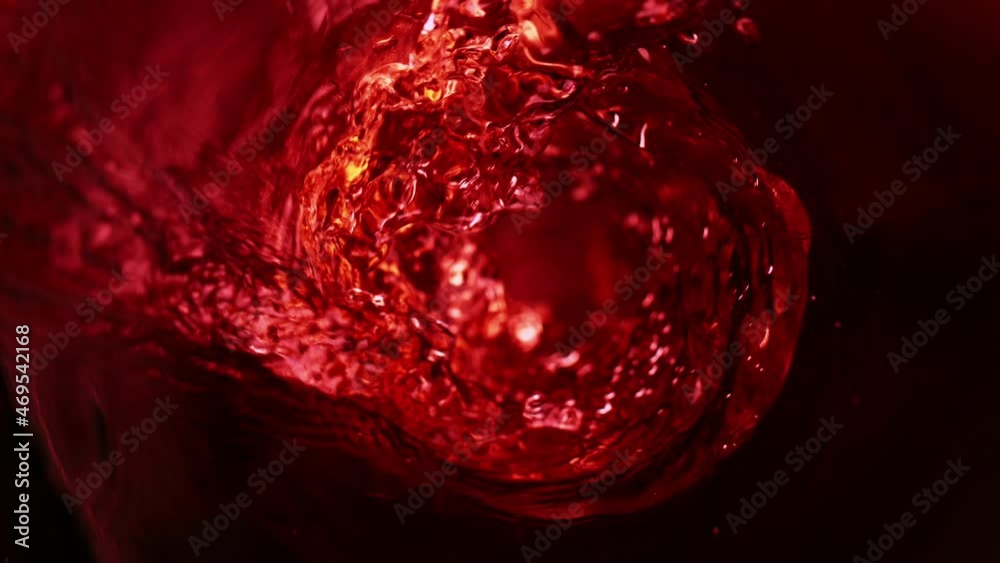 Super slow motion of pouring red wine in twister shape. Filmed on high speed cinema camera Super slow motion of pouring red wine in twister shape. Filmed on high speed cinema camera