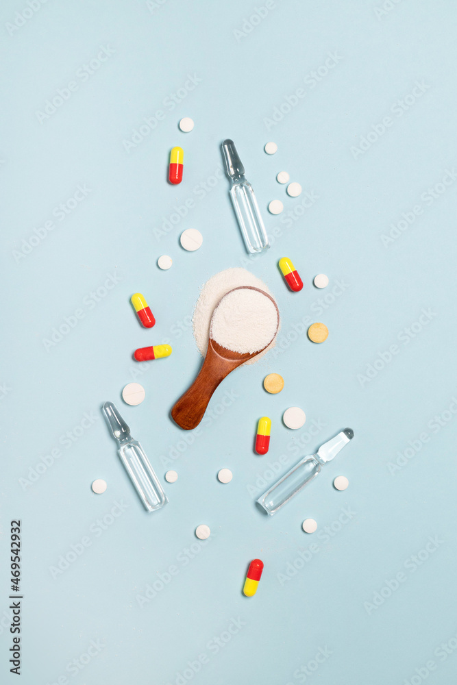 Assorted pharmaceutical medicine pills, tablets and capsules on blue background. Healthcare and medical Assorted pharmaceutical medicine pills, tablets and capsules on blue background. Healthcare and medical