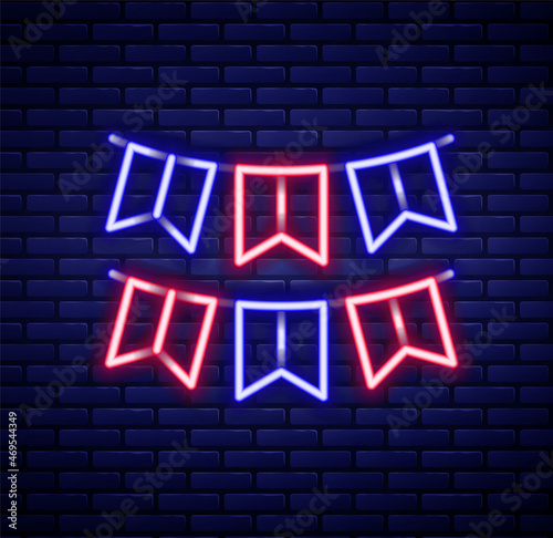Glowing neon line Carnival garland with flags icon isolated on brick wall background. Party pennants for birthday celebration, festival decoration. Colorful outline concept. Vector