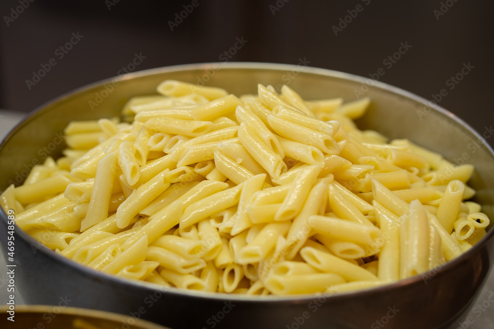 bowl of cooked macaroni. ready for your favorite sauce. bowl of cooked macaroni. ready for your favorite sauce.