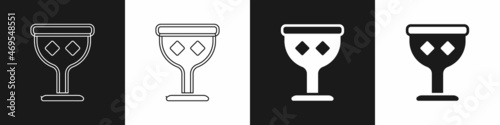 Set Medieval goblet icon isolated on black and white background. Holy grail. Vector
