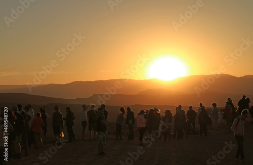 Silhouette of Many Visitors on the Cliff Watching the Scenery Sunset at Valle de la Luna in Atacama Desert, Los Flamencos National Reserve, Northern Chile