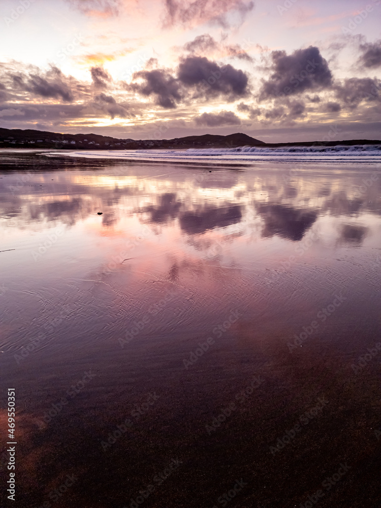 Dramatic sunset at Narin Strand by Portnoo, County Donegal in Ireland.