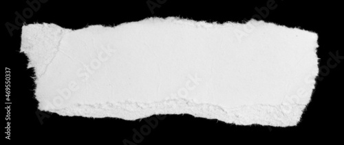 a white piece of paper on a black isolated background
