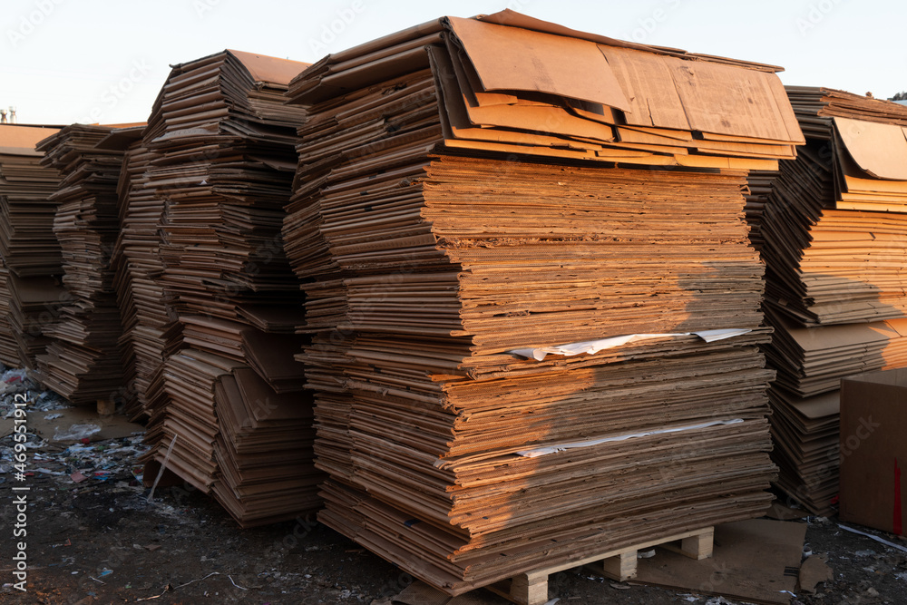 Photo of a large amount of cardboard in production. Photo of a large amount of cardboard in production.