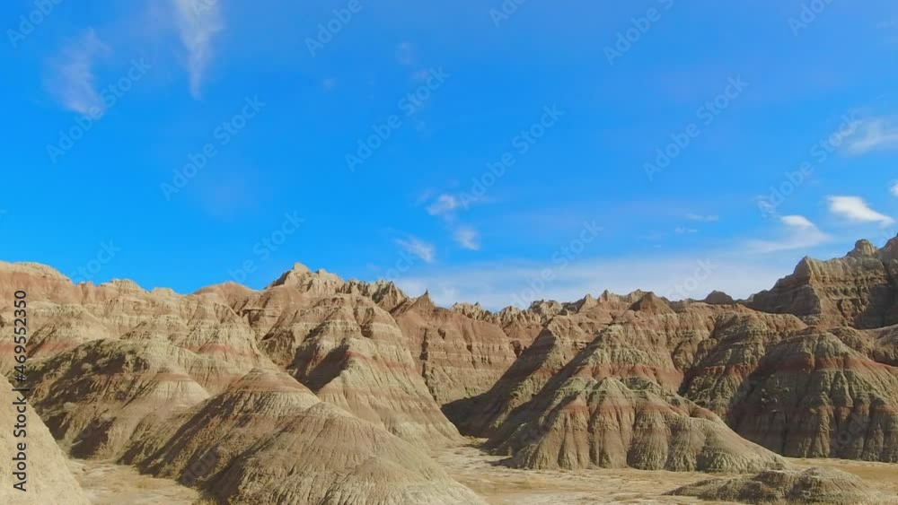Badlands National Park from near Saddle Pass Trailhead, along US Highway 240. Camera movement trucks from left to right, from a moving vehicle. Badlands National Park from near Saddle Pass Trailhead, along US Highway 240. Camera movement trucks from left to right, from a moving vehicle.
