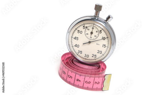 Stopwatch and measuring meter on white background.Sports, health and fitness.