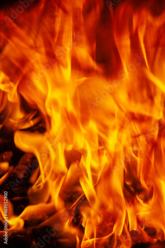 Fire background as symbol of hell and eternal pain. Vertical image.