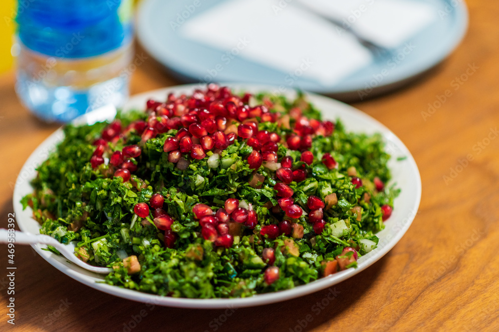 Tabbouleh is a Levantine salad made mostly of finely chopped parsley Tabbouleh Chopped Parsley Tabouli Syrian Salad, lebanese salad, turkish salad. High quality photo Tabbouleh is a Levantine salad made mostly of finely chopped parsley Tabbouleh Chopped Parsley Tabouli Syrian Salad, lebanese salad, turkish salad. High quality photo