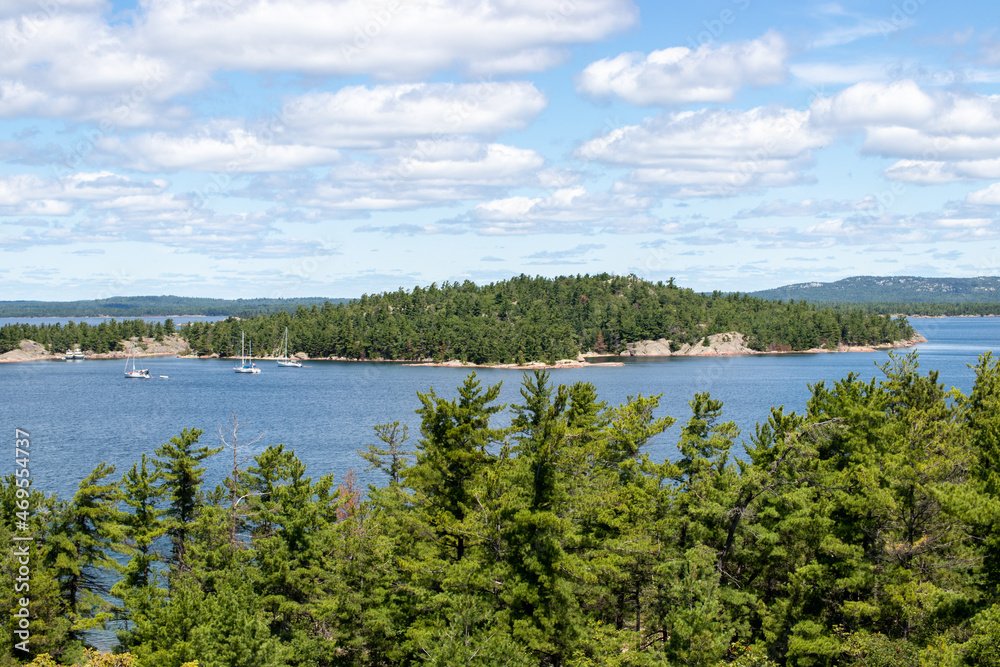 Boats moored in a protected cove