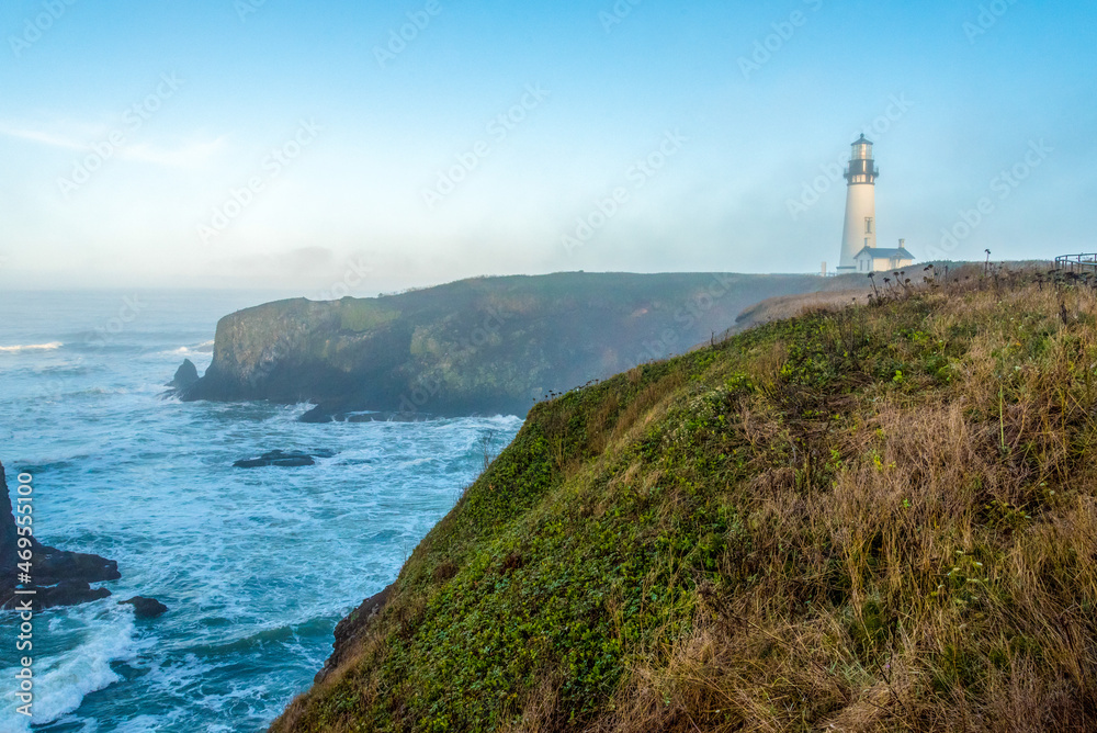 Scenic lighthouse in the early morning, Yaquina head in Oregon