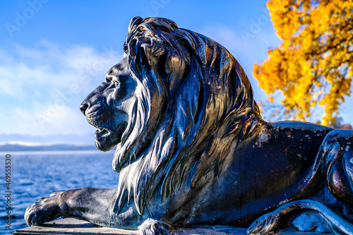 historic lion statue at the lake starnberg photo