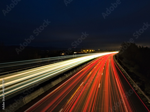 Highway at night with car lights