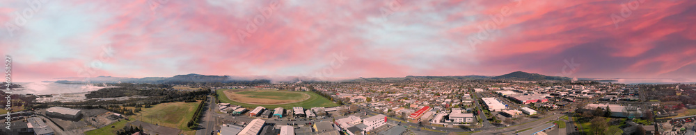 Fototapeta premium Panoramic aerial view of Rotorua landscape and geysers smoke, New Zealand from drone