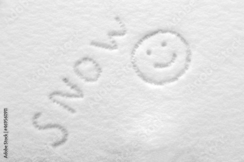 snow texture is drawn with a smiley face and the inscription snow