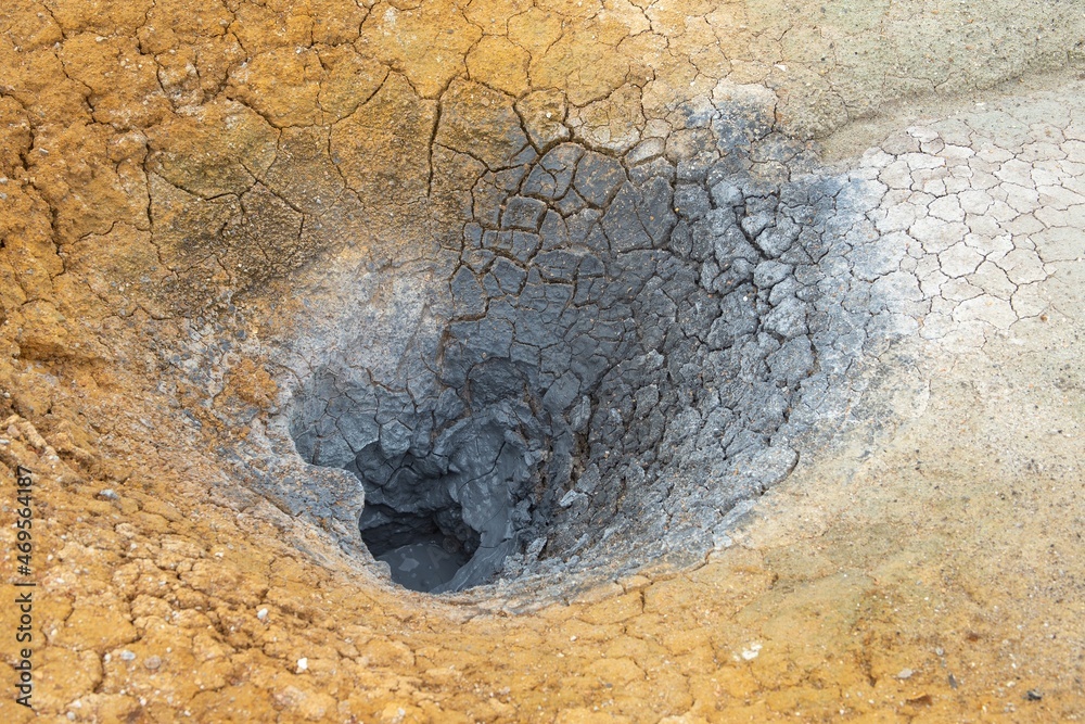 Naklejka premium Boiled mud thermal cater in Uzon - a volcanic caldera, Kamchatka Peninsula, Russia