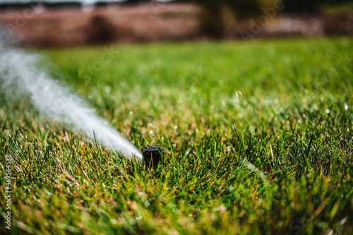 winterizing a irrigation sprinkler system by blowing pressurized air through to clear out water