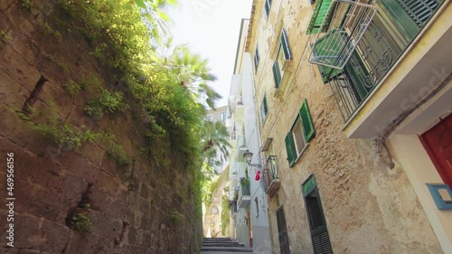 A narrow street in an Italian town Sorrento. Amalfi, Italy, architecture, gimbal move, camera move, path / 4K Video Footage