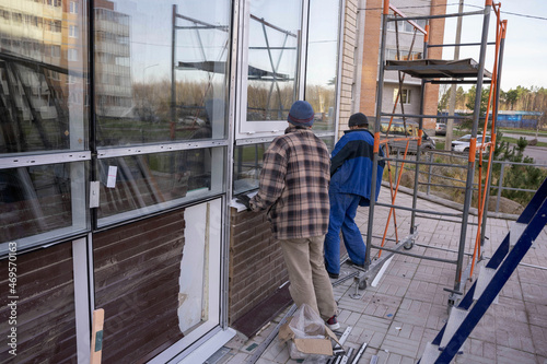 Replacement of double-glazed windows in shop windows, reconstruction of the supermarket facade, repair of windows