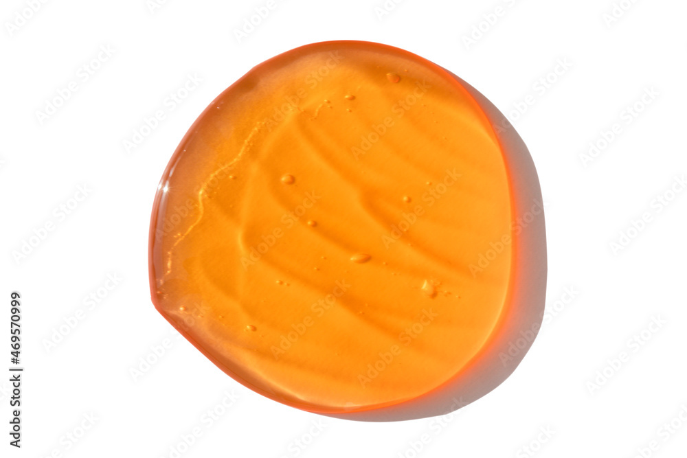 Orange cosmetics or antiseptic gel, cleaner or serum drop isolated on white background . Colorful amber slime with air bubbles in the sunlight. High contrast trendy photo. Health protection concept Orange cosmetics or antiseptic gel, cleaner or serum drop isolated on white background . Colorful amber slime with air bubbles in the sunlight. High contrast trendy photo. Health protection concept
