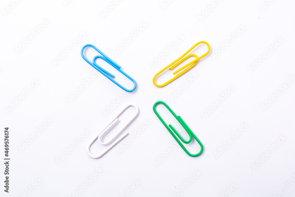 Colorful plastic paper clipson on a white background Colorful plastic paper clipson on a white background
