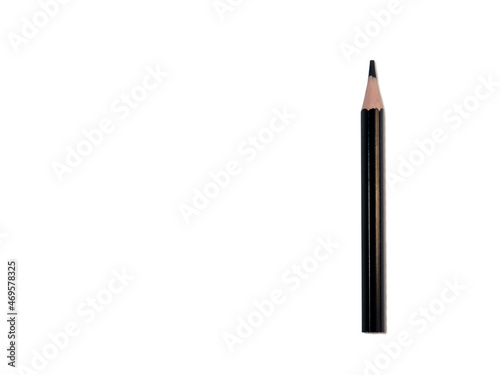 Colored pencil on a white background. Black short pencil made of wood.
