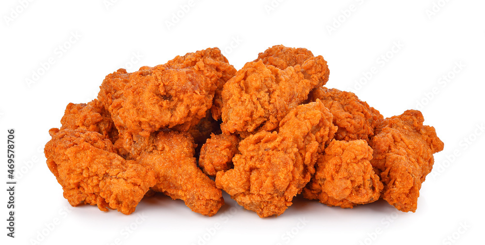 Heap of fried spicy chicken isolated on white background. Heap of fried spicy chicken isolated on white background.