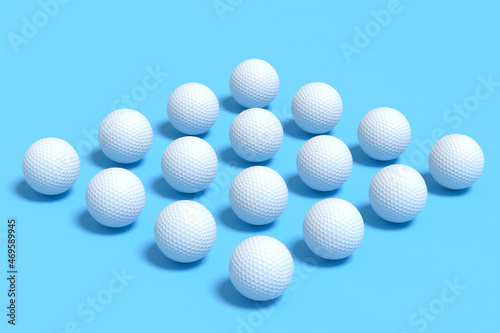 Set of golf ball lying in row on blue background