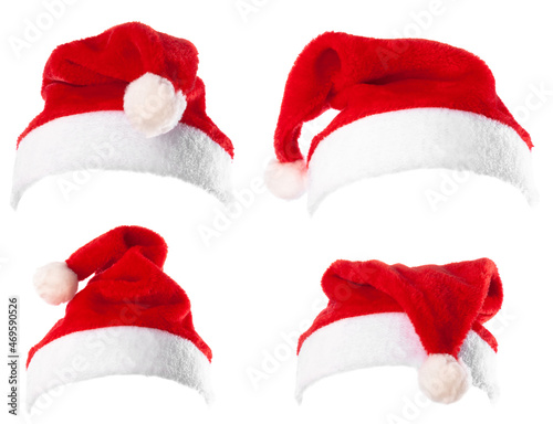 Set of 4 red Santa Claus hats isolated on white background