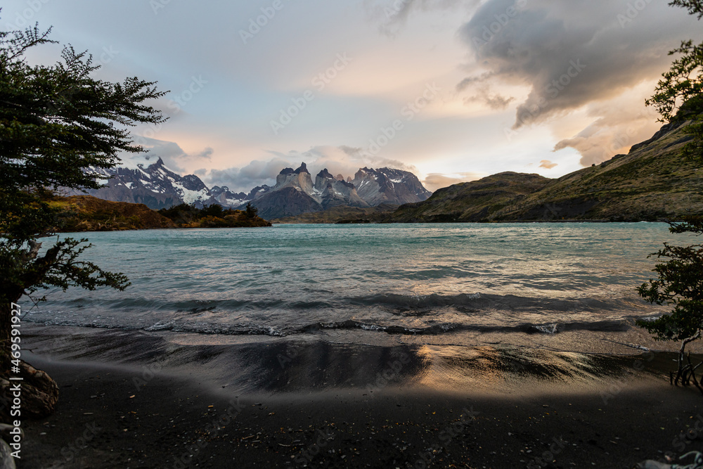 Smooth waves of Pehoe lake with the Torres del Paine on the background,Torres del Paine National Park, Chile