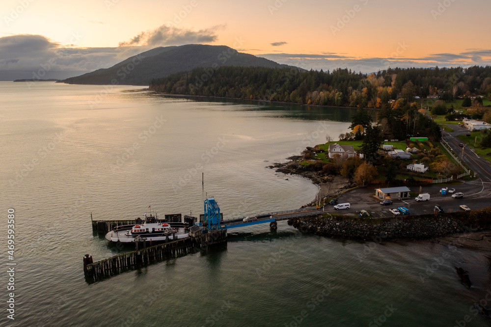 Aerial View of a Small Car Ferry Servicing Lummi Island, Washington. Transportation to and from the island requires a 21 car ferry as seen here in this aerial view.