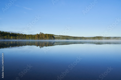 A lake in the morning mist