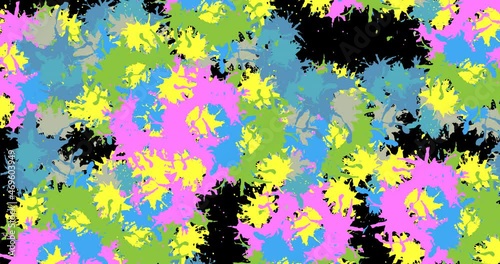 Animation of multi coloured splashes of paint on black background photo