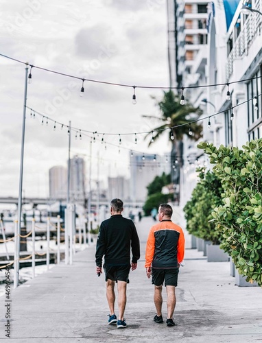 people walking on the street Miami Florida couple man boy urban 