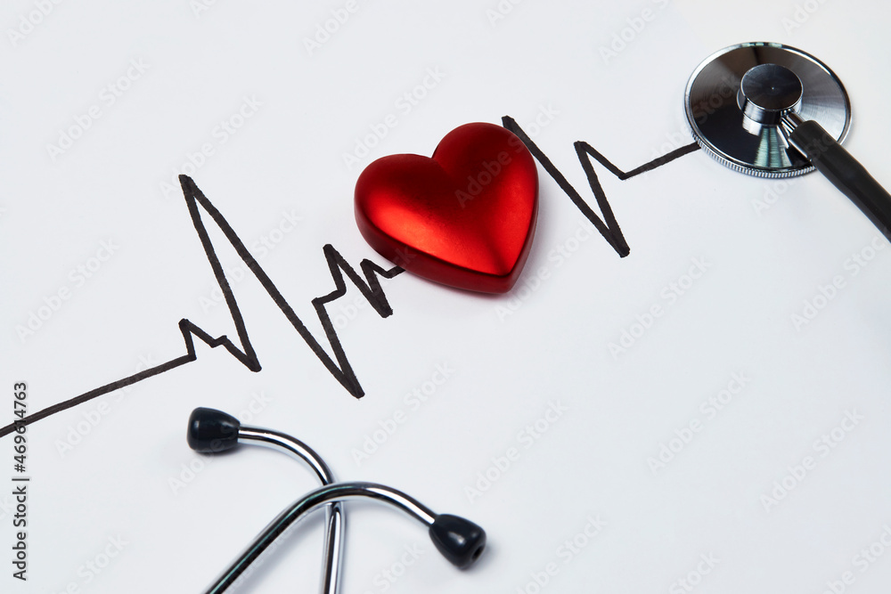 Stethoscope and red heart with cardiogram on white background Stethoscope and red heart with cardiogram on white background