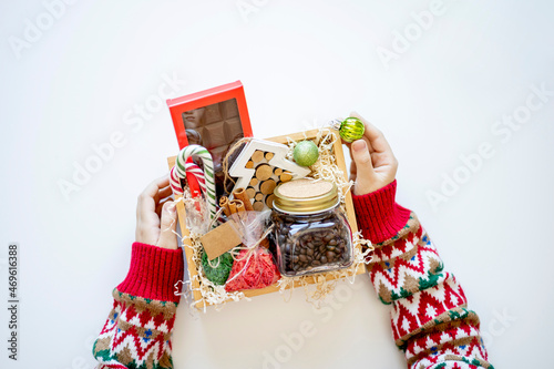 Preparing self care package. Seasonal gift box with items for coffee drinking. Flat lay. Copy space