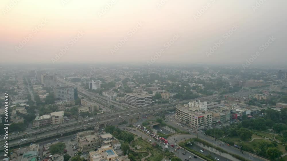 Tracking Aerial Shot Of Car Congestion On Busy Highways In Pakistan At Sunset
