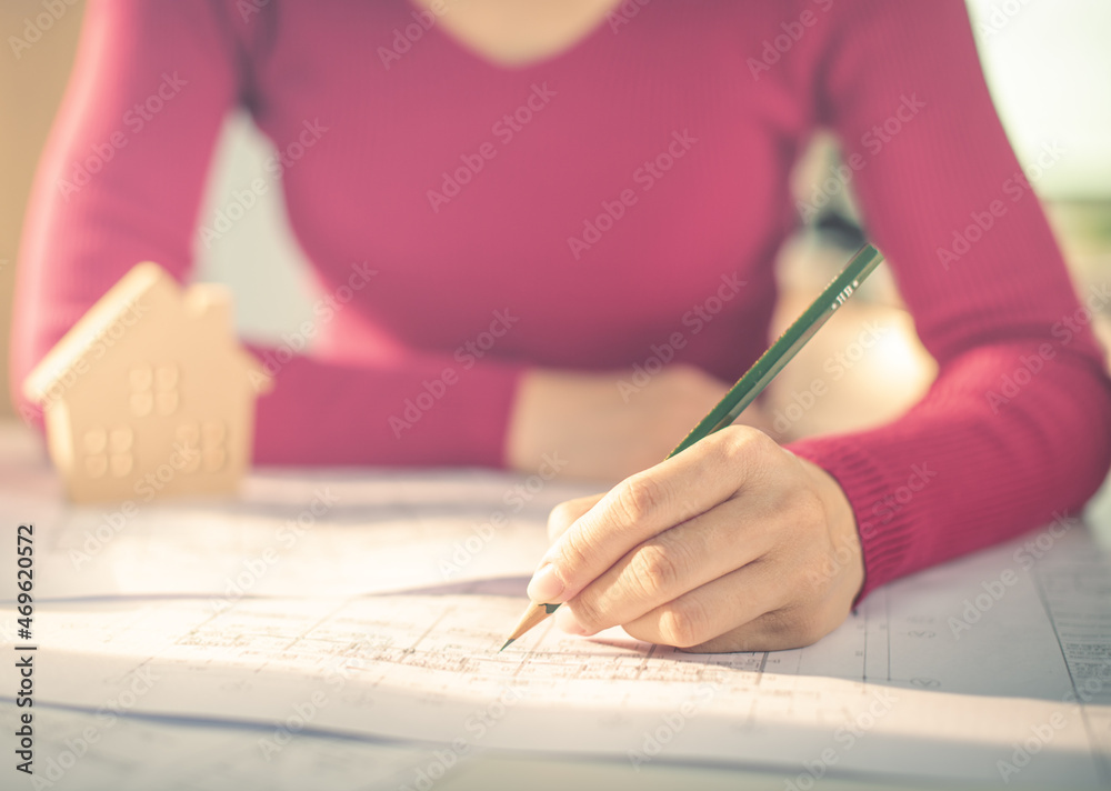 Architect working on blueprint. Architects workplace - architectural ...