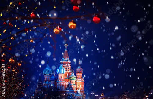 Winter Moscow Russia Red square with snow. Christmas holidays St Basils Cathedral new year background bokeh