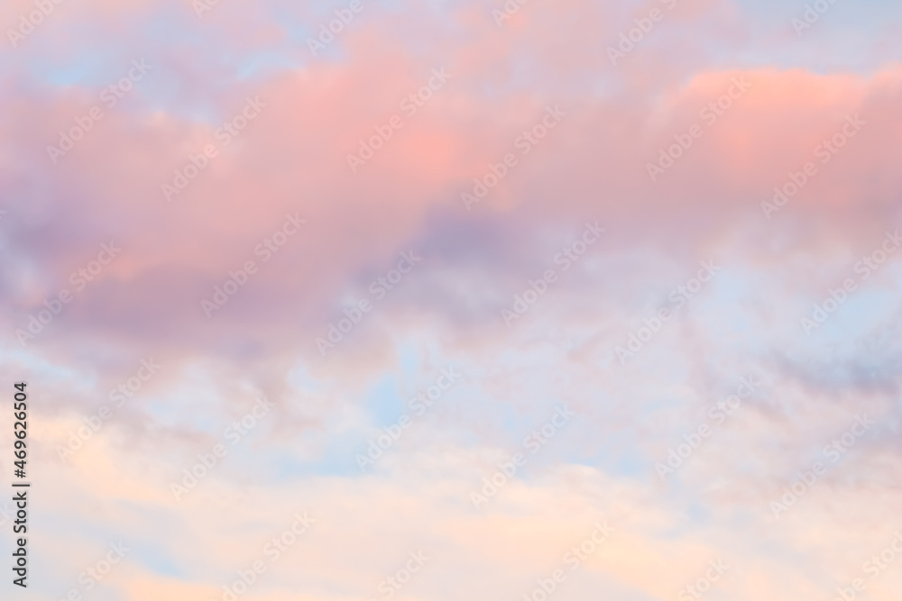 Pink pastel sky and clouds background. Pink and white pastel sky