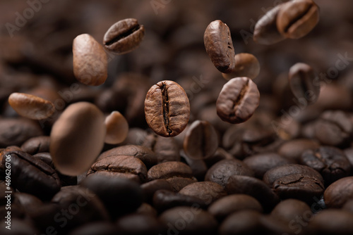 close up dropping coffee beans background
