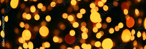 new year's holiday orange background with bokeh © Anastasiia