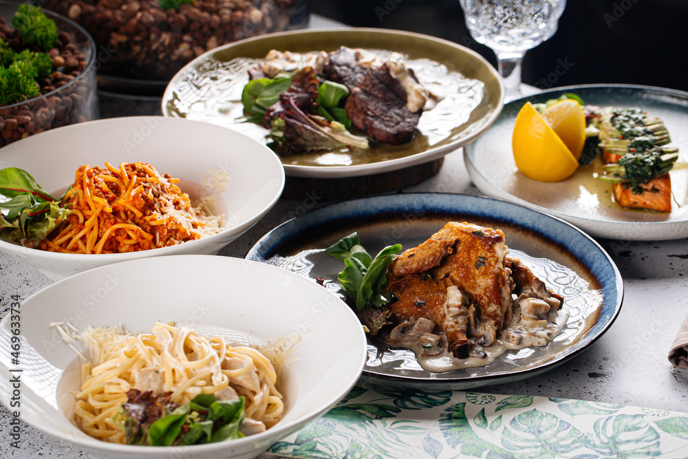 Set of different gourmet mediterranean dishes on the table