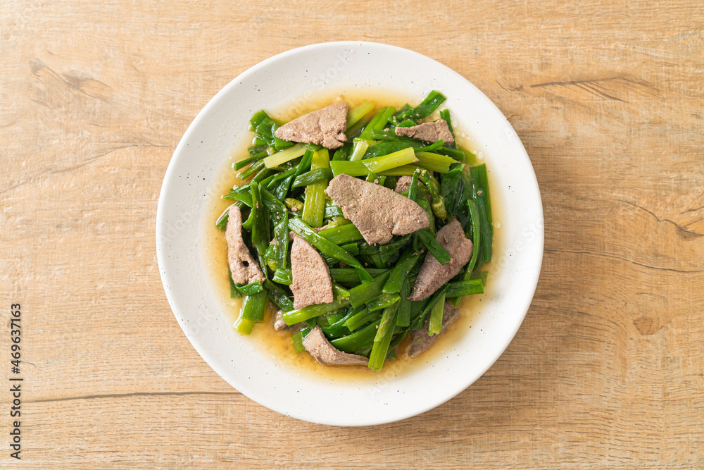 Stir-fried onion flower stem with pork liver Stir-fried onion flower stem with pork liver
