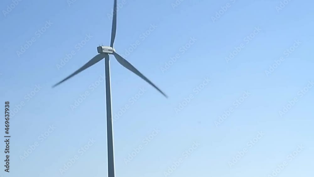 Wind turbine farm with blue sky no people stock video