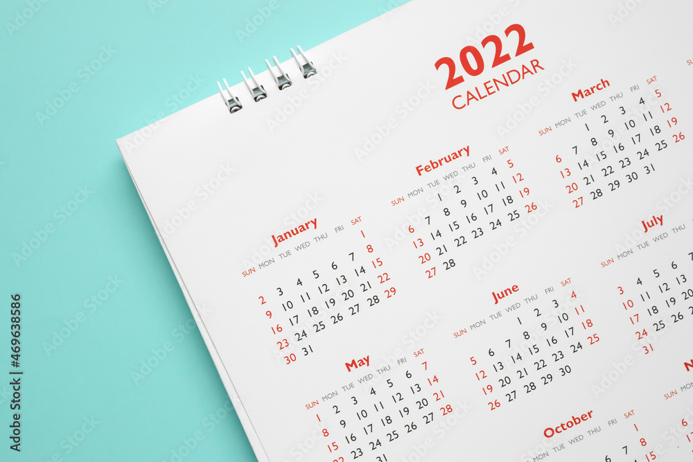 2022 calendar page on blue background business planning appointment meeting concept 2022 calendar page on blue background business planning appointment meeting concept