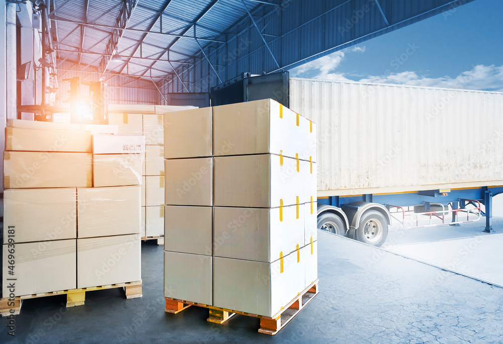 Packaging Boxes on Pallets Loading with Shipping Cargo Container. Truck  Parked Loading at Dock Warehouse. Supply Chain Shipment Logistics. Cargo  Freight Truck Transportation. Photos | Adobe Stock