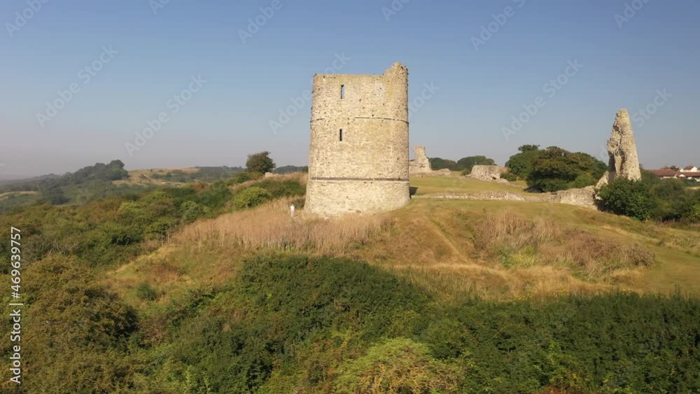 Stone Watch Tower On Hill With Slope Overgrown With Trees And Shrubs Stone Watch Tower On Hill With Slope Overgrown With Trees And Shrubs