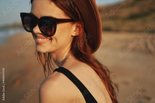 woman in sunglasses near car travel summer vacation landscape